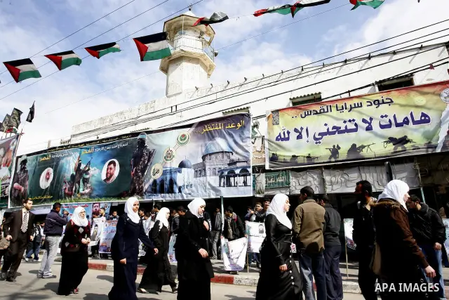 Palestinian students participate in a protest in solidarity with Khader Adnan, 33, a jailed senior member of Islamic Jihad who has been on hunger strike for nearly 60 days days as they called for the release of Palestini...