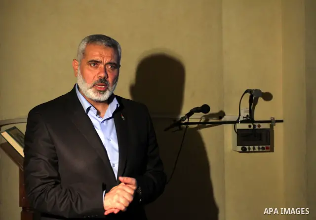 Palestinian prime minister in Gaza Strip, Ismail Haniyah speaks to Palestinians, in Gaza city on Feb. 16,2012 after his arrival to Gaza Strip from a tour to Qatar, Bahrain, Kuwait, Iran and U.A.E. Photo by Mohammed Asad