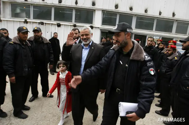 Palestinian Prime Minister in Gaza Strip, Ismail Haniyeh arrives to the Gaza Strip through Rafah border crossing between the Gaza Strip and Egypt ,Thursday, Feb. 16, 2012. Haniyeh's trip included a visit to Iran where he...