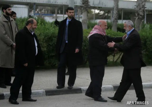 Palestinian Prime Minister in Gaza Strip, Ismail Haniyeh arrives to the Gaza Strip through Rafah border crossing between the Gaza Strip and Egypt ,Thursday, Feb. 16, 2012. Haniyeh's trip included a visit to Iran where he...