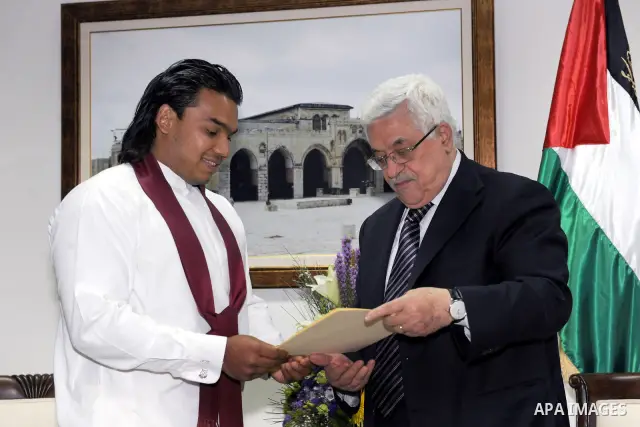 Palestinian President Mahmoud Abbas (Abu Mazen) meets with Sri Lankan president's envoy, Namal Rjapkh in the West bank City of Ramallah on Feb. 19, 2012. Photo by Thaer Ganaim