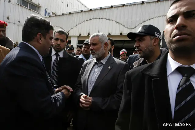 Palestinian Prime Minister in Gaza Strip, Ismail Haniya, arrived to the Rafah border crossing in the southern Gaza Strip on Feb. 20, 2012. during his visits in Egypt to discuss issue a power cut in Gaza strip and the clo...