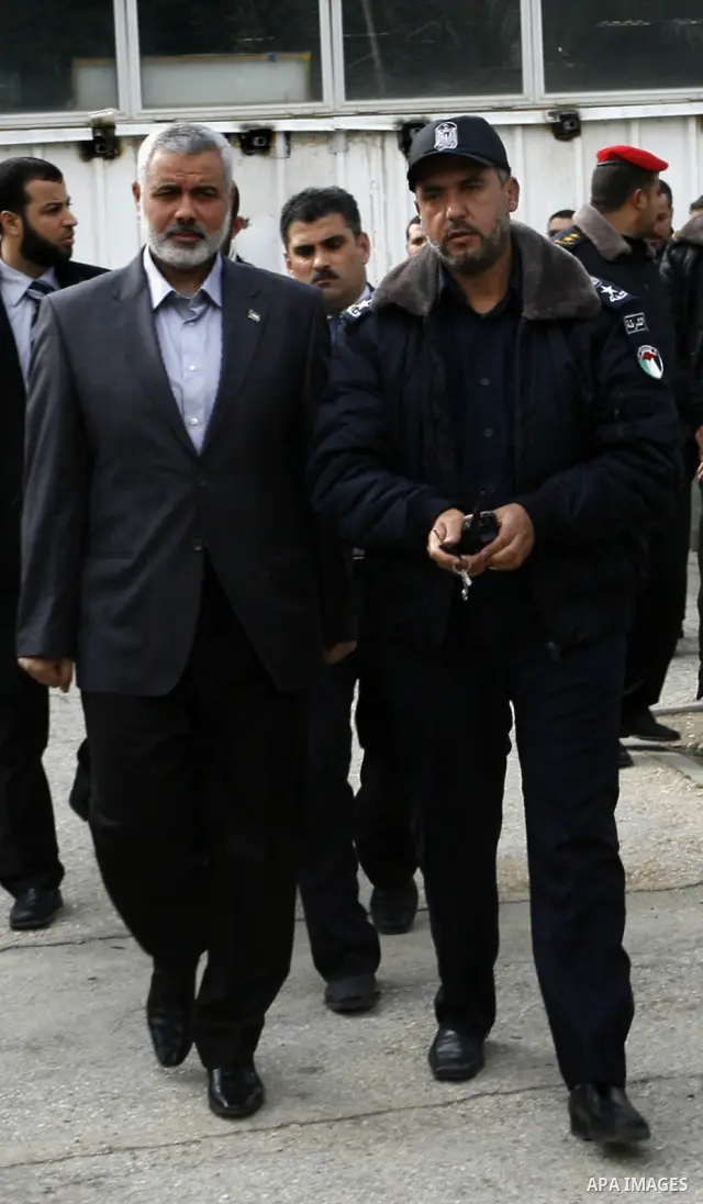 Palestinian Prime Minister in Gaza Strip, Ismail Haniya, arrived to the Rafah border crossing in the southern Gaza Strip on Feb. 20, 2012. during his visits in Egypt to discuss issue a power cut in Gaza strip and the clo...