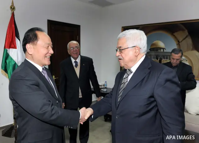 Palestinian President, Mahmoud Abbas (Abu Mazen), meets with the Chinese envoy to the peace process to the Middle East, Ambassador, Wu Sike, in the West Bank city of Ramallah on Feb 20, 2012. Photo by Thaer Ghanaim