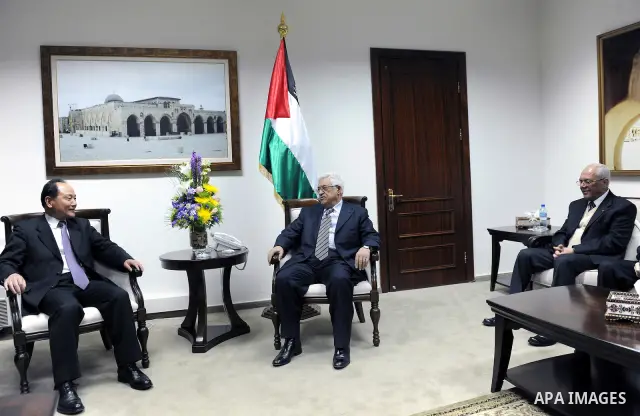 Palestinian President, Mahmoud Abbas (Abu Mazen), meets with the Chinese envoy to the peace process to the Middle East, Ambassador, Wu Sike, in the West Bank city of Ramallah on Feb 20, 2012. Photo by Thaer Ghanaim