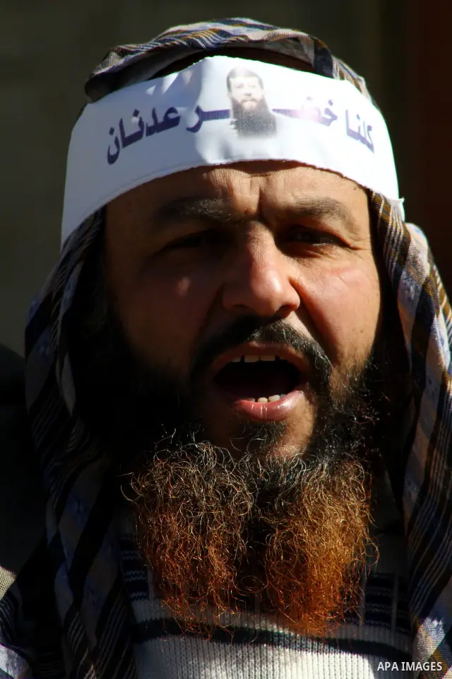 Palestinian supporters of the Islamic Jihad militant group participate in a protest in solidarity with Khader Adnan, a senior member of Islamic Jihad jailed in Israel who has been on hunger strike for 66 days, in Gaza Ci...