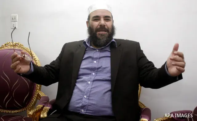 Egyptian Tareq al-Zomor, a member of Egypt's Islamic Jihad, speaks to media at his house in Cairo on Feb. 20, 2012. Al-Zomor, who jailed over the 1981 assassination of president Anwar Sadat, was released from Egyptian pr...
