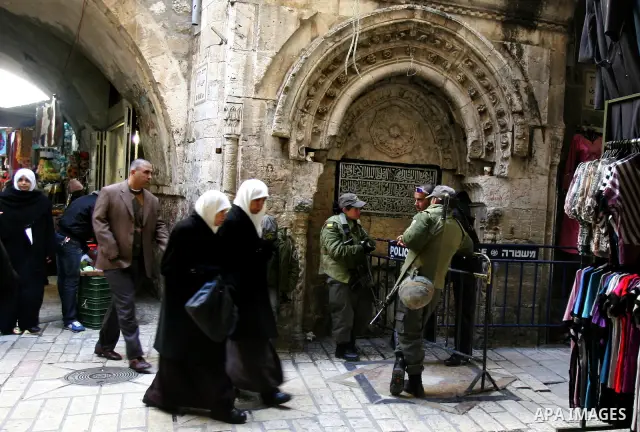 Israeli border policemen stand guard outside the Al-Aqsa mosque compound in Jerusalem’s Old City on February 21, 2012 after Israeli police and tourists visiting the site were stoned according to a police spokesman. A Pal...