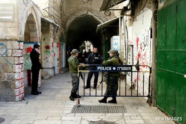 Israeli border policemen stand guard outside the Al-Aqsa mosque compound in Jerusalem’s Old City on February 21, 2012 after Israeli police and tourists visiting the site were stoned according to a police spokesman. A Pal...