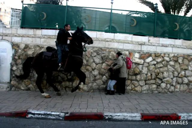 Israeli border policemen stand guard outside the Al-Aqsa mosque compound in Jerusalem’s Old City on February 21, 2012 after Israeli police and tourists visiting the site were stoned according to a police spokesman. A Pal...