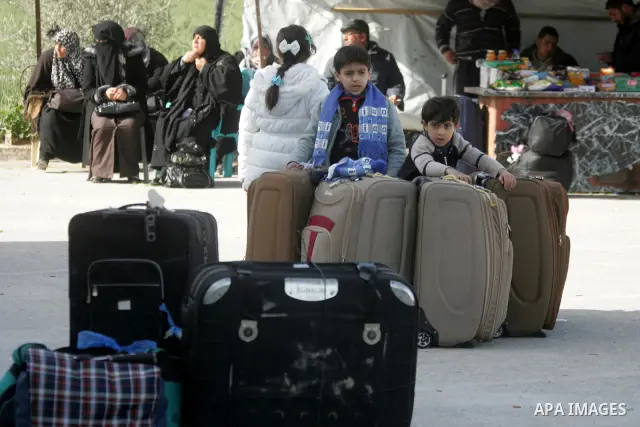 Palestinians wait to cross the Rafah border crossing in the southern Gaza Strip into Egypt on Feb. 22, 2012. Maher Abu Sabha, Director General of the crossings in the Gaza government resign from office an Interior Minist...