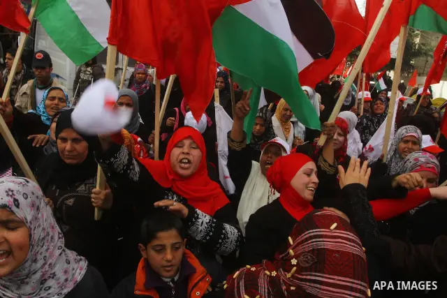Supporters of the Democratic Front for the Liberation of Palestine (DFLP) shout slogans during a rally marking the 43rd anniversary of the movement's establishment in Gaza City on February 23, 2012. Photo by Ashraf Amra