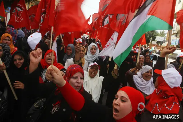Supporters of the Democratic Front for the Liberation of Palestine (DFLP) shout slogans during a rally marking the 43rd anniversary of the movement's establishment in Gaza City on February 23, 2012. Photo by Ashraf Amra
