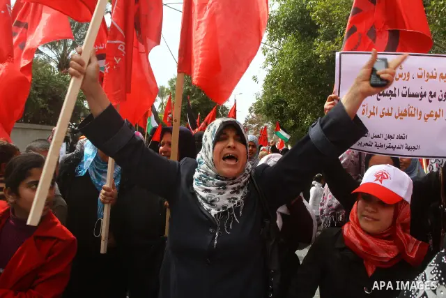 Supporters of the Democratic Front for the Liberation of Palestine (DFLP) shout slogans during a rally marking the 43rd anniversary of the movement's establishment in Gaza City on February 23, 2012. Photo by Ashraf Amra