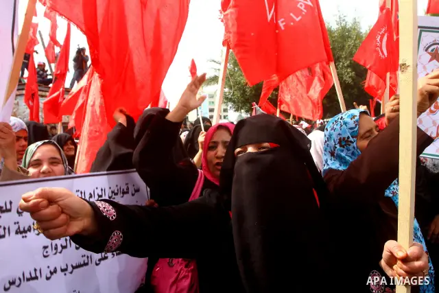 Supporters of the Democratic Front for the Liberation of Palestine (DFLP) shout slogans during a rally marking the 43rd anniversary of the movement's establishment in Gaza City on February 23, 2012. Photo by Ashraf Amra