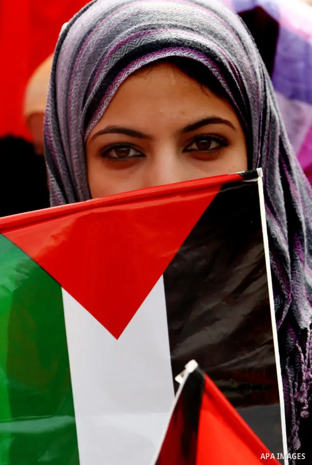 Supporters of the Democratic Front for the Liberation of Palestine (DFLP) shout slogans during a rally marking the 43rd anniversary of the movement's establishment in Gaza City on February 23, 2012. Photo by Ashraf Amra