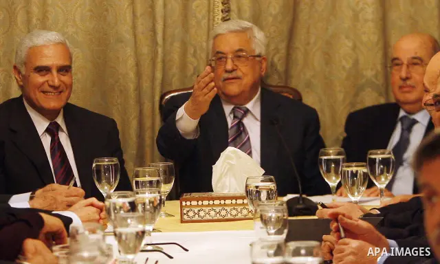 Egyptian intelligence chief Murad Muwafi, Palestinian President Mahmoud Abbas, and Hamas leader Khaled Meshaal, during a meeting between Fatah and Hamas in Cairo, Egypt, 23 February 2012. According to media reports, the...