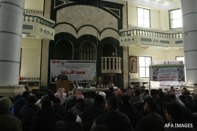 Palestinian legislative council members and members of Kuwaiti delegation attend the opening ceremony of al-Abrar mosque, which was destroyed during the Israeli war on Gaza Strip in 2008-2009, in the southern Gaza Strip...