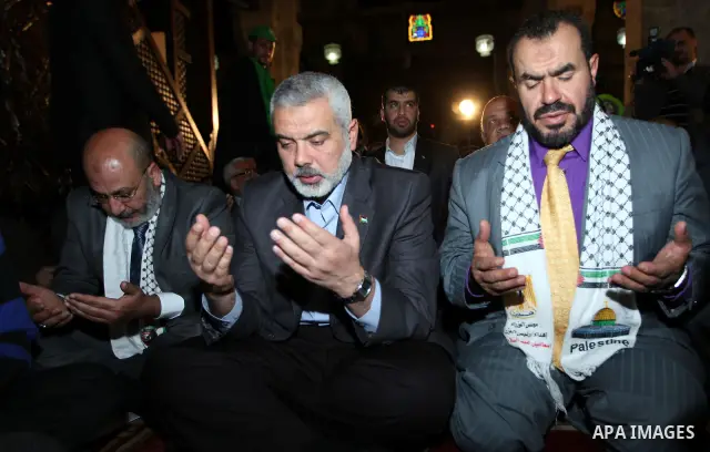 Hamas leader Ismail Haniyeh attends Friday noon prayer at Al-Azhar mosque, in Cairo, Egypt, 24 February 2012. According to media reports, the leaders of the Palestinian movements Hamas and Fatah are in Egypt for talks on...