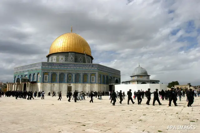 Israeli policemen walk in front of the Dome of the Rock during clashes with Palestinian protesters on the compound known to Muslims as the Noble Sanctuary and to Jews as the Temple Mount in Jerusalem's Old City February...