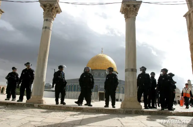 Israeli policemen stand guard during clashes with Palestinian protesters on the compound known to Muslims as the Noble Sanctuary and to Jews as the Temple Mount in Jerusalem's Old City February 24, 2012. Israeli policeme...