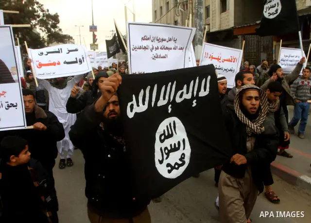 Palestinian Salafists take part in a protest against Syria's President Bashar al-Assad in Rafah in the southern Gaza Strip February 24, 2012. The black flag reads "There is no god but Allah and Mohammad is the prophet"....