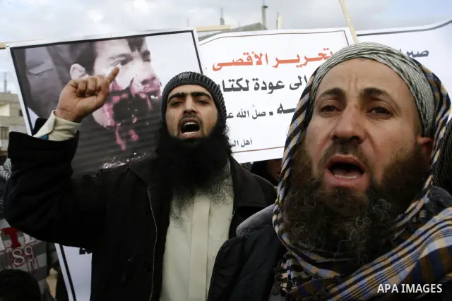 A Palestinian Salafist takes part in a protest against Syria's President Bashar al-Assad in Rafah in the southern Gaza Strip February 24, 2012. Photo by Abed Rahim Khatib