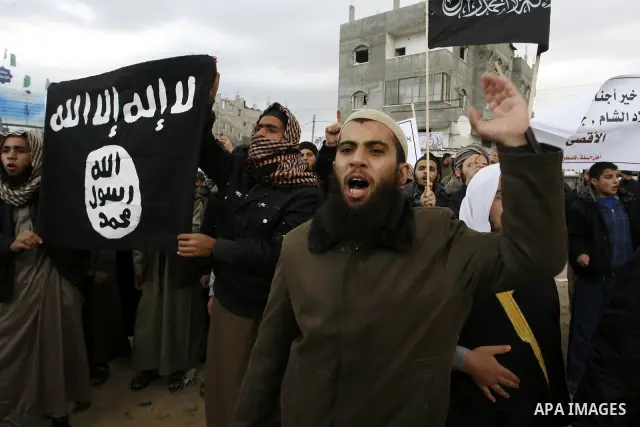 Palestinian Salafists take part in a protest against Syria's President Bashar al-Assad in Rafah in the southern Gaza Strip February 24, 2012. The black flag reads "There is no god but Allah and Mohammad is the prophet"....