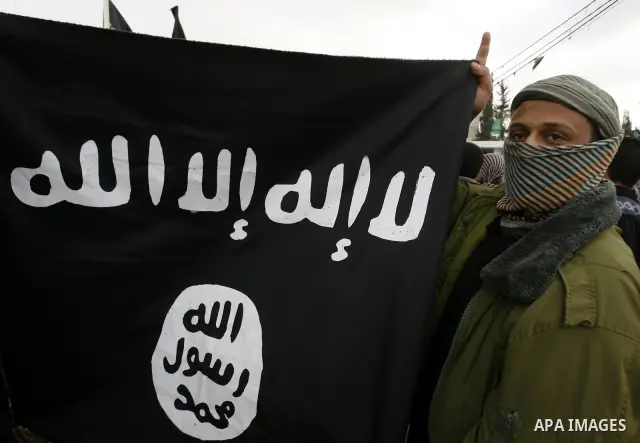 Palestinian Salafists take part in a protest against Syria's President Bashar al-Assad in Rafah in the southern Gaza Strip February 24, 2012. The black flag reads "There is no god but Allah and Mohammad is the prophet"....