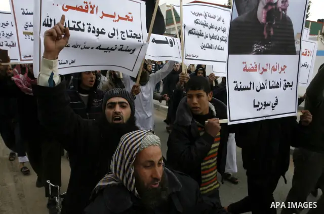 A Palestinian Salafist takes part in a protest against Syria's President Bashar al-Assad in Rafah in the southern Gaza Strip February 24, 2012. Photo by Abed Rahim Khatib