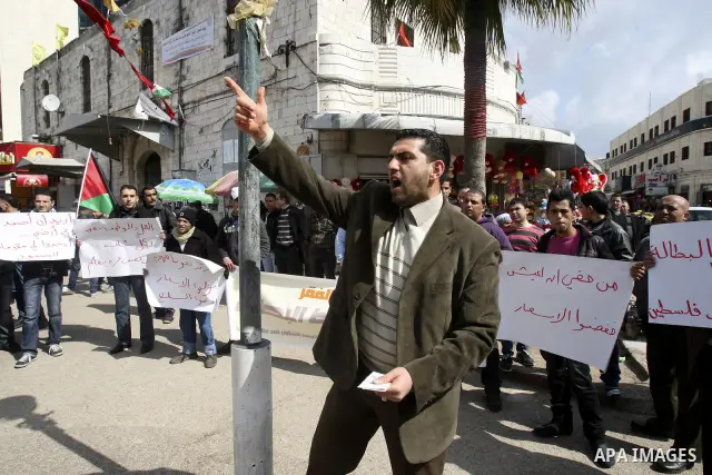 Palestinians participate protest against rising prices and taxes in the city of Nablus West Bank, Saturday, Feb. 25, 2012. Photo by Wagdi Eshtayah