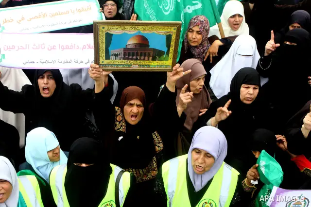 Palestinian women gather as they protest in Gaza City on February 26, 2012, two days following violence in the flashpoint Al-Aqsa mosque compound in Jerusalem's Old City, between Israeli forces and Palestinians. The unre...