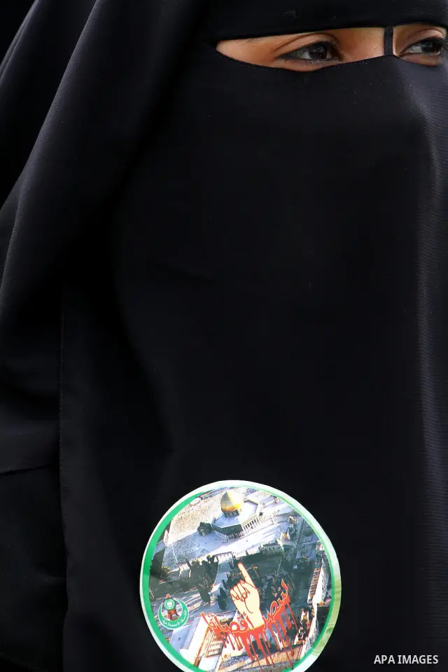 Palestinian women gather as they protest in Gaza City on February 26, 2012, two days following violence in the flashpoint Al-Aqsa mosque compound in Jerusalem's Old City, between Israeli forces and Palestinians. The unre...