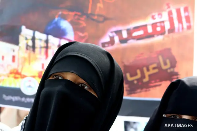 Palestinian women gather as they protest in Gaza City on February 26, 2012, two days following violence in the flashpoint Al-Aqsa mosque compound in Jerusalem's Old City, between Israeli forces and Palestinians. The unre...