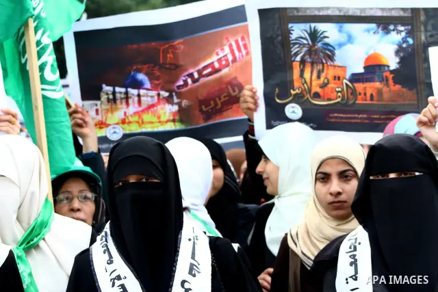 Palestinian women gather as they protest in Gaza City on February 26, 2012, two days following violence in the flashpoint Al-Aqsa mosque compound in Jerusalem's Old City, between Israeli forces and Palestinians. The unre...