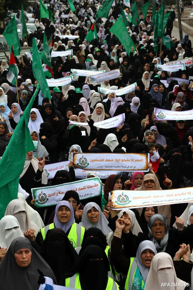Palestinian women gather as they protest in Gaza City on February 26, 2012, two days following violence in the flashpoint Al-Aqsa mosque compound in Jerusalem's Old City, between Israeli forces and Palestinians. The unre...