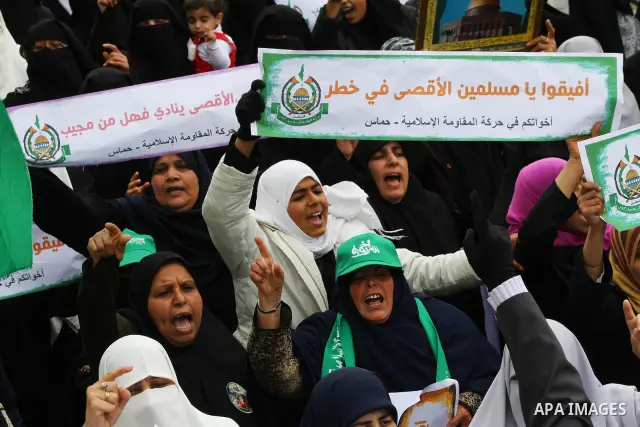 Palestinian women gather as they protest in Gaza City on February 26, 2012, two days following violence in the flashpoint Al-Aqsa mosque compound in Jerusalem's Old City, between Israeli forces and Palestinians. The unre...