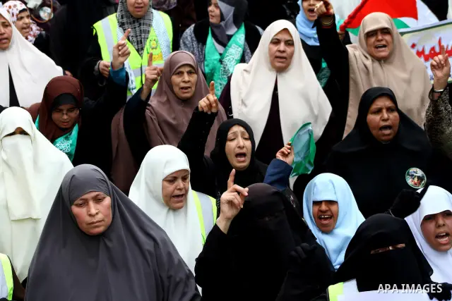 Palestinian women gather as they protest in Gaza City on February 26, 2012, two days following violence in the flashpoint Al-Aqsa mosque compound in Jerusalem's Old City, between Israeli forces and Palestinians. The unre...