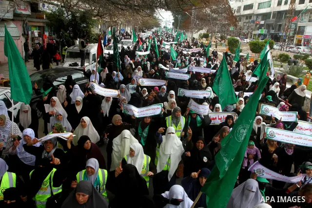Palestinian women gather as they protest in Gaza City on February 26, 2012, two days following violence in the flashpoint Al-Aqsa mosque compound in Jerusalem's Old City, between Israeli forces and Palestinians. The unre...