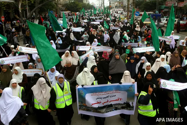 Palestinian women gather as they protest in Gaza City on February 26, 2012, two days following violence in the flashpoint Al-Aqsa mosque compound in Jerusalem's Old City, between Israeli forces and Palestinians. The unre...
