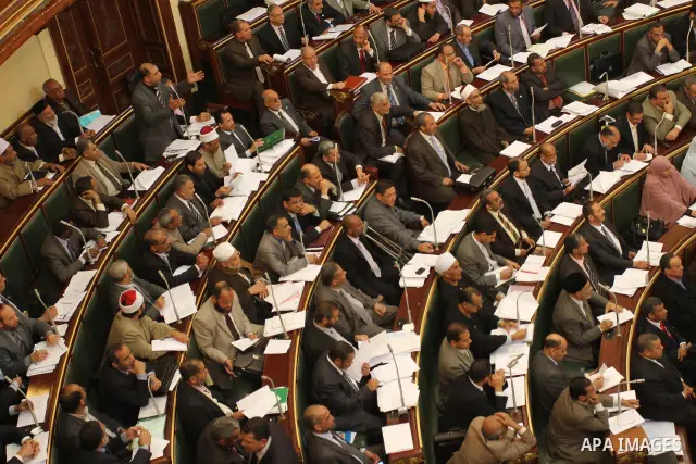 Egypt's army-appointed Prime Minister Kamal al-Ganzouri speaks during a parliament session in Cairo February 26, 2012. Egypt's military rulers invited the parliament's two houses to convene on Saturday to elect an assemb...