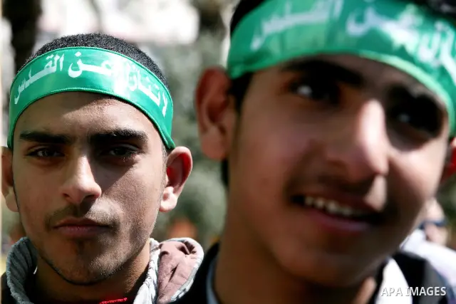 Palestinian students gather as they protest in Gaza City on February 27, 2012, two days following violence in the flashpoint Al-Aqsa mosque compound in Jerusalem's Old City, between Israeli forces and Palestinians. The u...