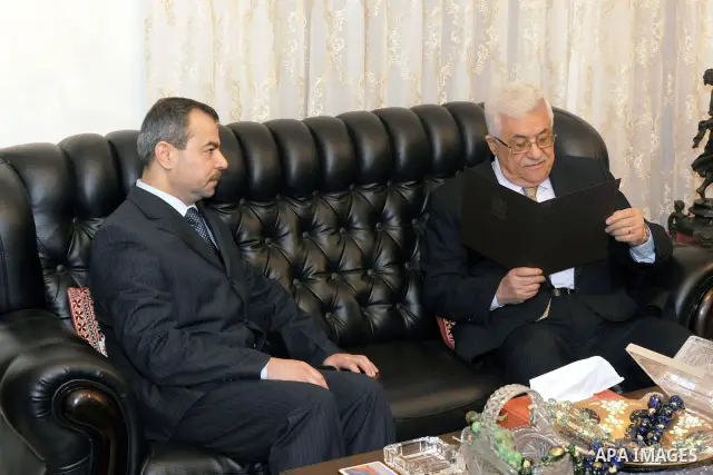 Palestinian President Mahmoud Abbas, receives an invitation from Iraqi President Jalal Talabani, to attend the Arab summit in the Jordan Capital of Amman, on Feb. 27, 2012. Photo by Thaer Ganaim