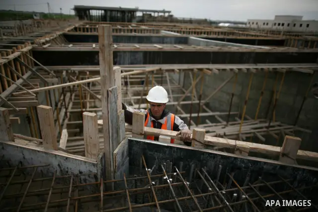 Palestinian workers work in building a sewage desalination station in the Northern Gaza Strip on Feb. 26, 2012. The Sewage desalination project is funded by the International Bank and EU with budget 40 million dollar. Th...