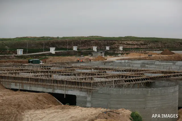 Palestinian workers work in building a sewage desalination station in the Northern Gaza Strip on Feb. 26, 2012. The Sewage desalination project is funded by the International Bank and EU with budget 40 million dollar. Th...