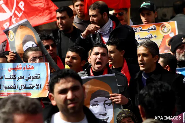 Palestinians demonstrate in solidarity with Hana'a Shalabi during a protest in Gaza City, on mar. 05, 2012. Shalabi, released by Israel in a prisoner swap last year but re-arrested earlier this month and held without cha...