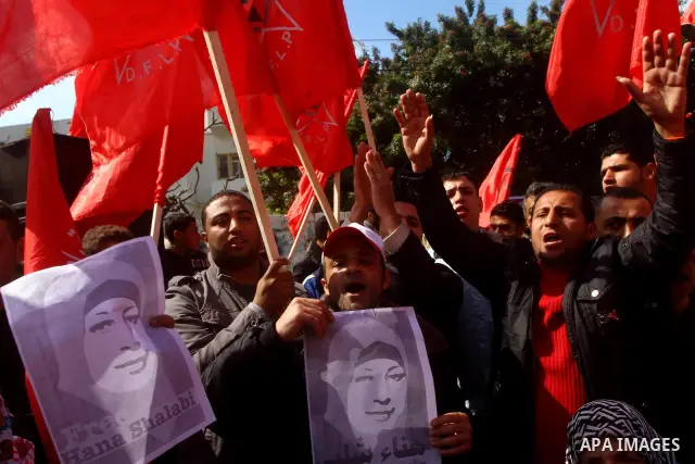Palestinians demonstrate in solidarity with Hana'a Shalabi during a protest in Gaza City, on mar. 05, 2012. Shalabi, released by Israel in a prisoner swap last year but re-arrested earlier this month and held without cha...