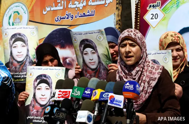 A Palestinian students of university demonstrate in solidarity with Hana'a Shalabi during a protest in front of red cross in Gaza City, on mar. 06, 2012. Shalabi, released by Israel in a prisoner swap last year but re-ar...