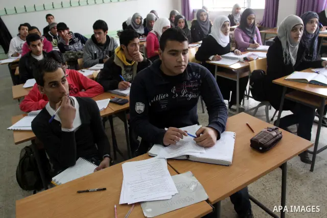 Palestinian students learn in the school Nahr al-Bared Palestinian refugee camp in Beirut, in Lebanon, March 6, 2012. About 25,000 person live in this poor refugee camp who face hard and difficult life. Photo by Mohammed...