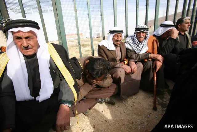 Palestinian mourners carry the bodies of two boys who were killed the previous day when unexploded military ordinance detonated outside Hebron, during their funeral in Wadi al-Rim, West Bank, 07 March 2012. Palestinian p...